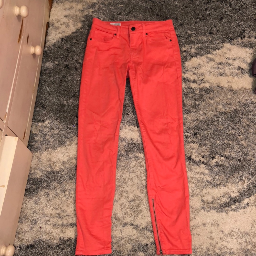 Salmon colored jeans